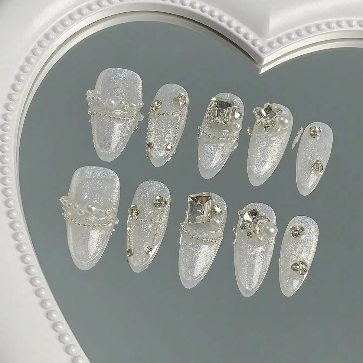 10 Pieces of Medium-Length Almond-Shaped Press-On Nails in Bright Mixed Nude Tones, Comes with a Piece of Nail Glue and a Nail F